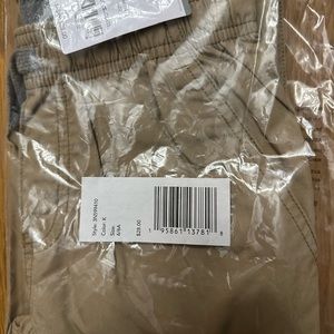 Boys size 6 Carter’s camel colored pants. Brand new in package